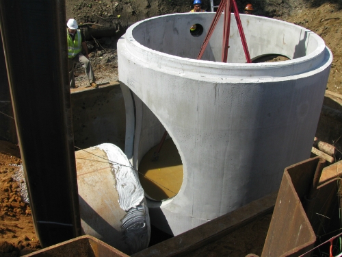 2160 A•LOK Premium Connector Being Installed onto Concrete Pipe